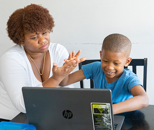 mom and son learning in the computer