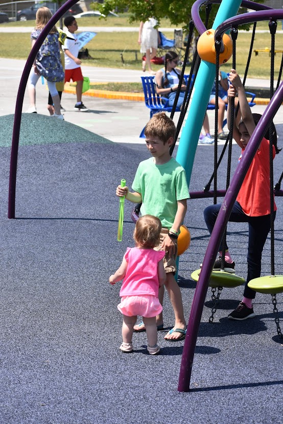 baby girl and boy in the park