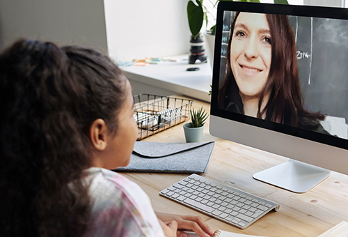 Student attending to an online class at home